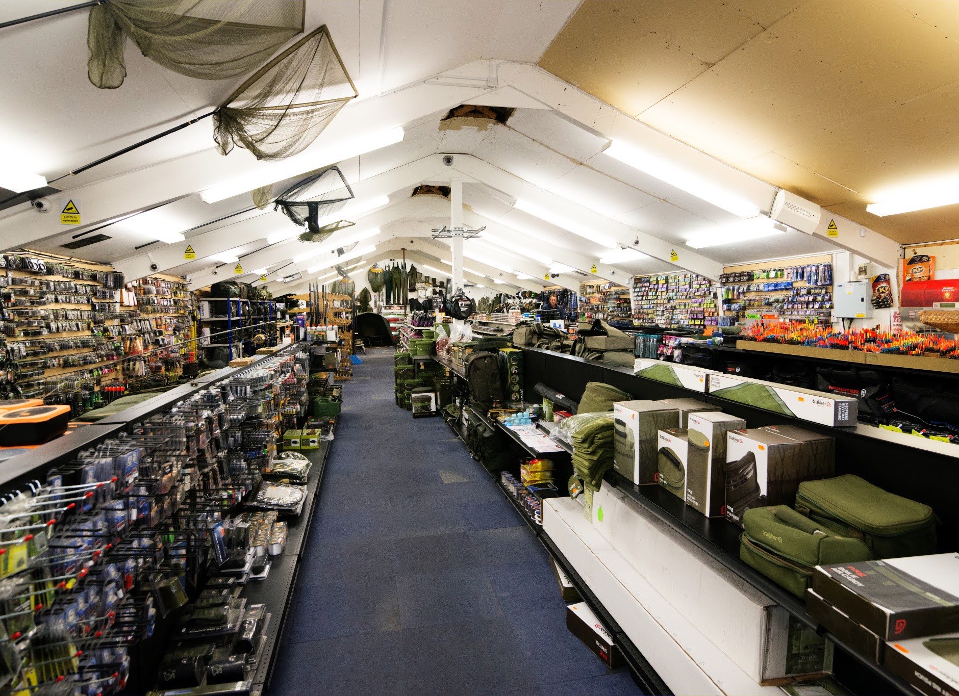 Inside Apollo Angling Centre — the main aisle